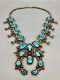 A Bold, Vintage Turquoise And Coral Squash Blossom Necklace