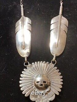 A Native American Sterling Silver and Turquoise Kachina Pendant, Bennie Ration