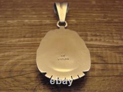 Native American Sterling Silver & Turquoise Pendant by Yellowhair