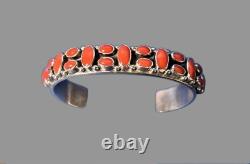Silver and Coral Native American Navajo Cuff Bracelet by R. J. Apacheto