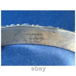 Silver and Coral Native American Navajo Cuff Bracelet by R. J. Apacheto