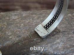 With tags Native American Navajo Twisted Sterling Silver Bracelet by Elaine Tahe
