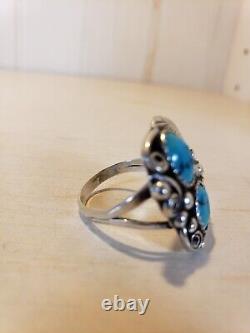 Bague vintage en argent sterling et turquoise des Amérindiens Navajo signée F taille 8.5