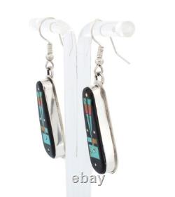 Boucles d'oreilles incrustées Yei amérindiennes navajo par Gilbert Smith SKU233189