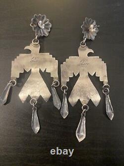 Boucles d'oreilles pendantes en argent sterling faites à la main par les Navajos amérindiens avec turquoise