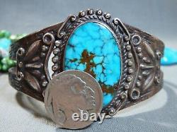 Bracelet en argent de monnaie 42g en turquoise naturelle POLYCHROME NAVAJO de l'époque Fred Harvey USA