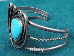 Bracelet en argent navajo amérindien avec un grand serti de turquoise