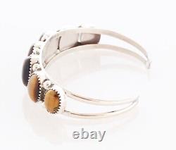 Bracelet en argent sterling fait main par un Amérindien Navajo avec œil de tigre
