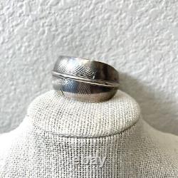 Bracelet manchette en argent sterling avec plume de Lena Platero, Amérindienne Navajo