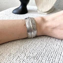 Bracelet manchette en argent sterling avec plume de Lena Platero, Amérindienne Navajo