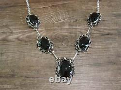 Collier en argent nickel et onyx de l'Indien Navajo signé Cleveland