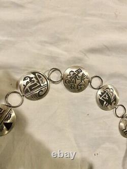 Conchos ronds en argent sterling avec superposition amérindienne par Jerry Cowboy Navajo