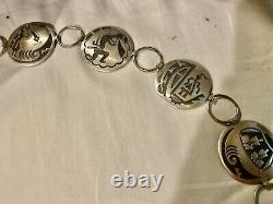 Conchos ronds en argent sterling avec superposition amérindienne par Jerry Cowboy Navajo