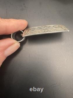Pendentif en argent sterling estampé à la main Navajo Geneva Ramone