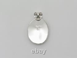 Pendentif en argent sterling et turquoise fait main par un Navajo Amérindien
