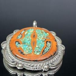 Pendentif ovale en argent sterling natif américain Navajo avec incrustation de turquoise et de noyer