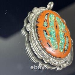 Pendentif ovale en argent sterling natif américain Navajo avec incrustation de turquoise et de noyer