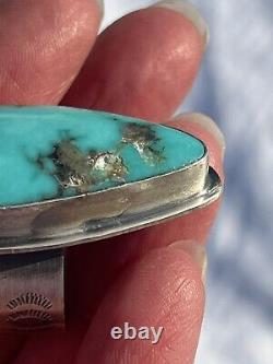 Translate this title in French: Bague en argent sterling et turquoise amérindienne Navajo, taille 7 1/2, neuve.